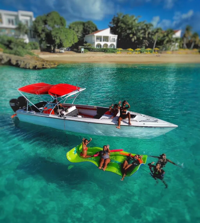 Travelers enjoying the water on a Kbyeee Getaways trip